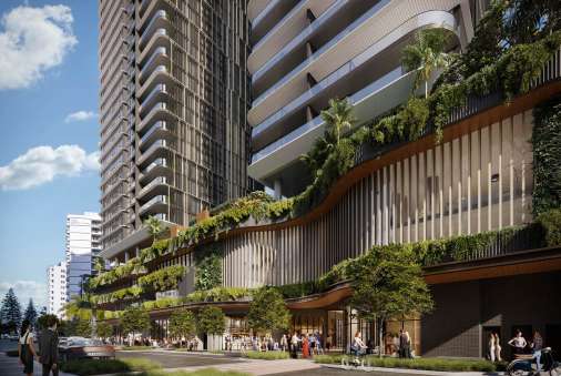 Ground plane of a high rise apartment building, with lush landscaping hanging from dramatic double-storey entrance